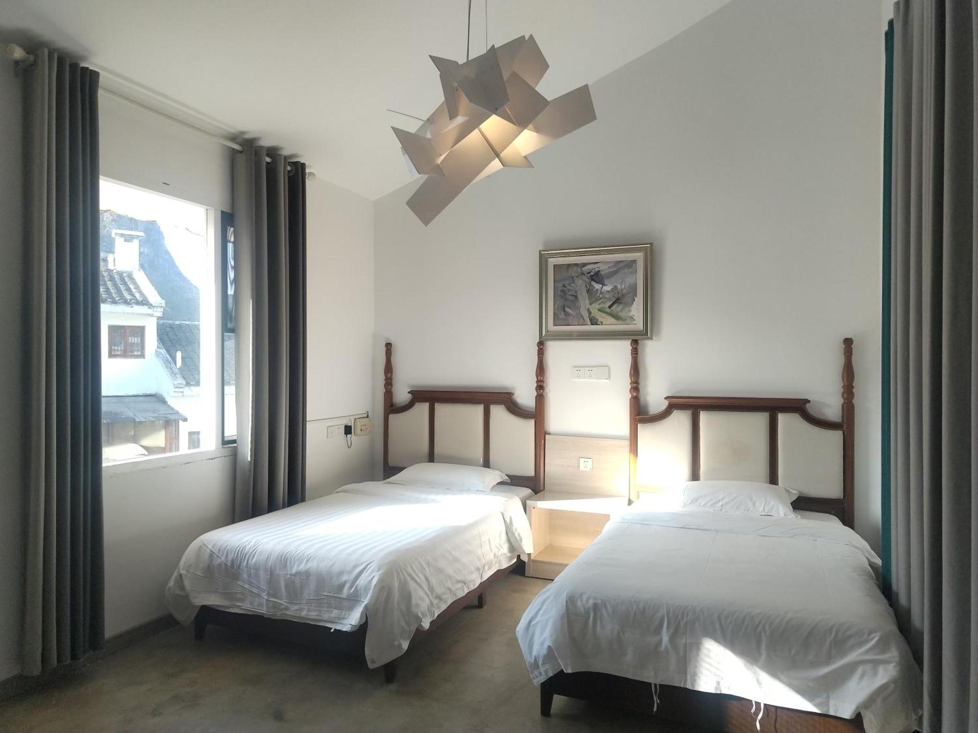 Serene Vale Inn Guilin-Free One Way Pick Up Service To High-Speed Railway Station For 2 Nights מראה חיצוני תמונה