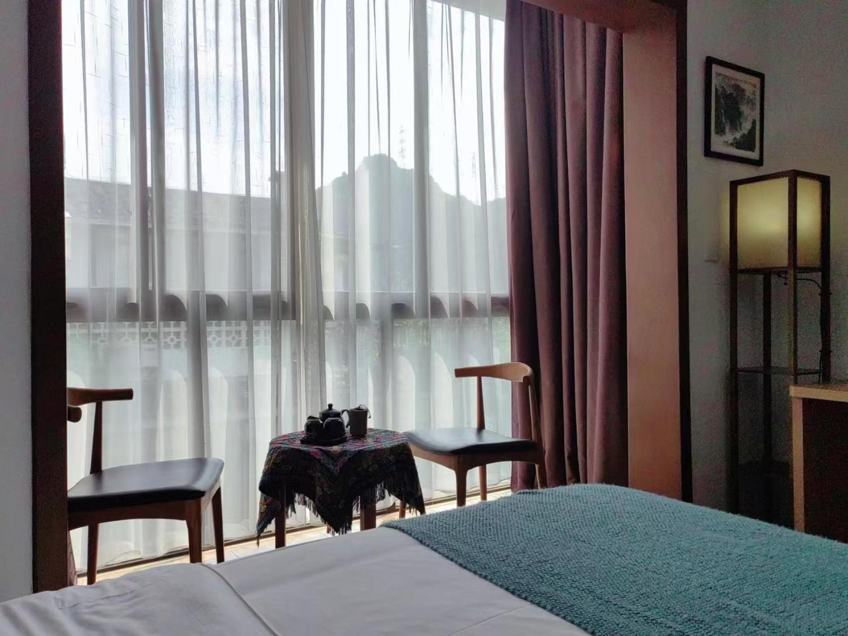 Serene Vale Inn Guilin-Free One Way Pick Up Service To High-Speed Railway Station For 2 Nights מראה חיצוני תמונה