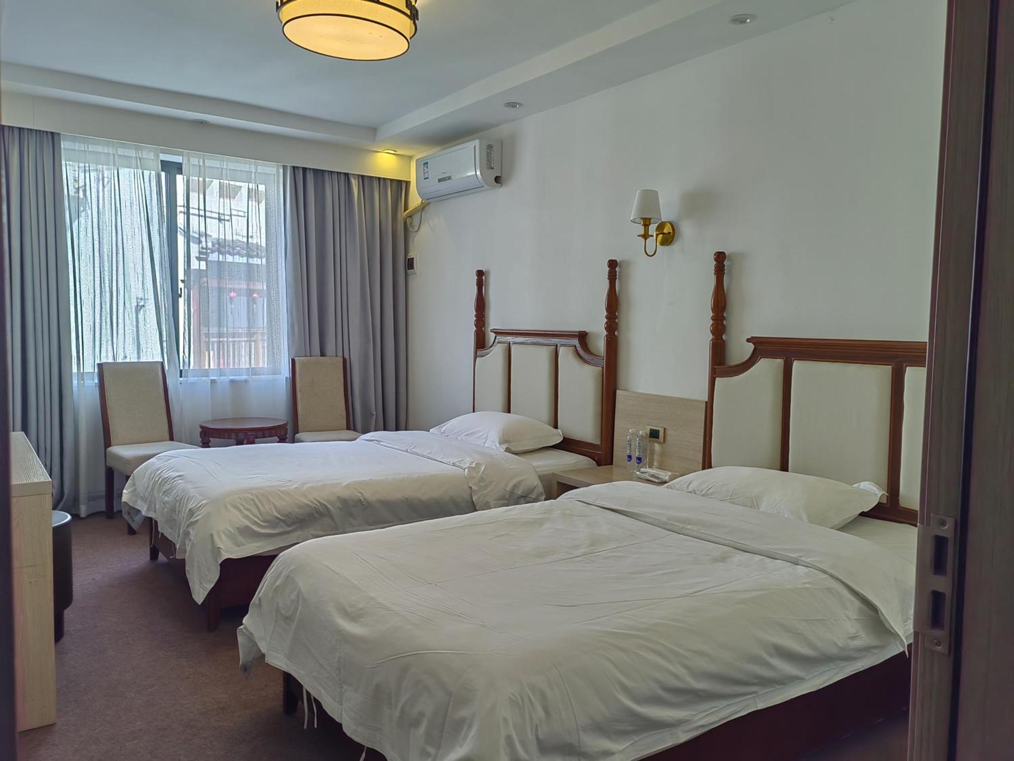 Serene Vale Inn Guilin-Free One Way Pick Up Service To High-Speed Railway Station For 2 Nights חדר תמונה